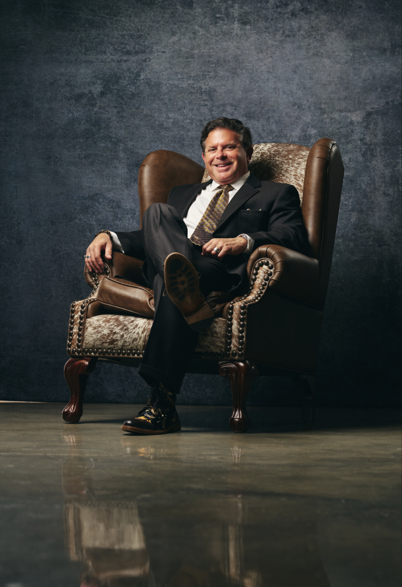 Dr. Rudy Triana seated in a private consultation room